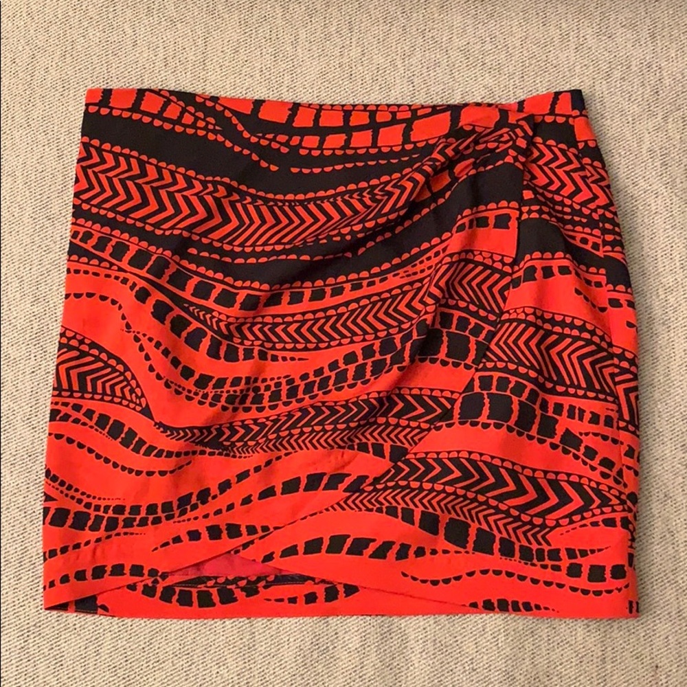Bebe red and black printed mini skirt